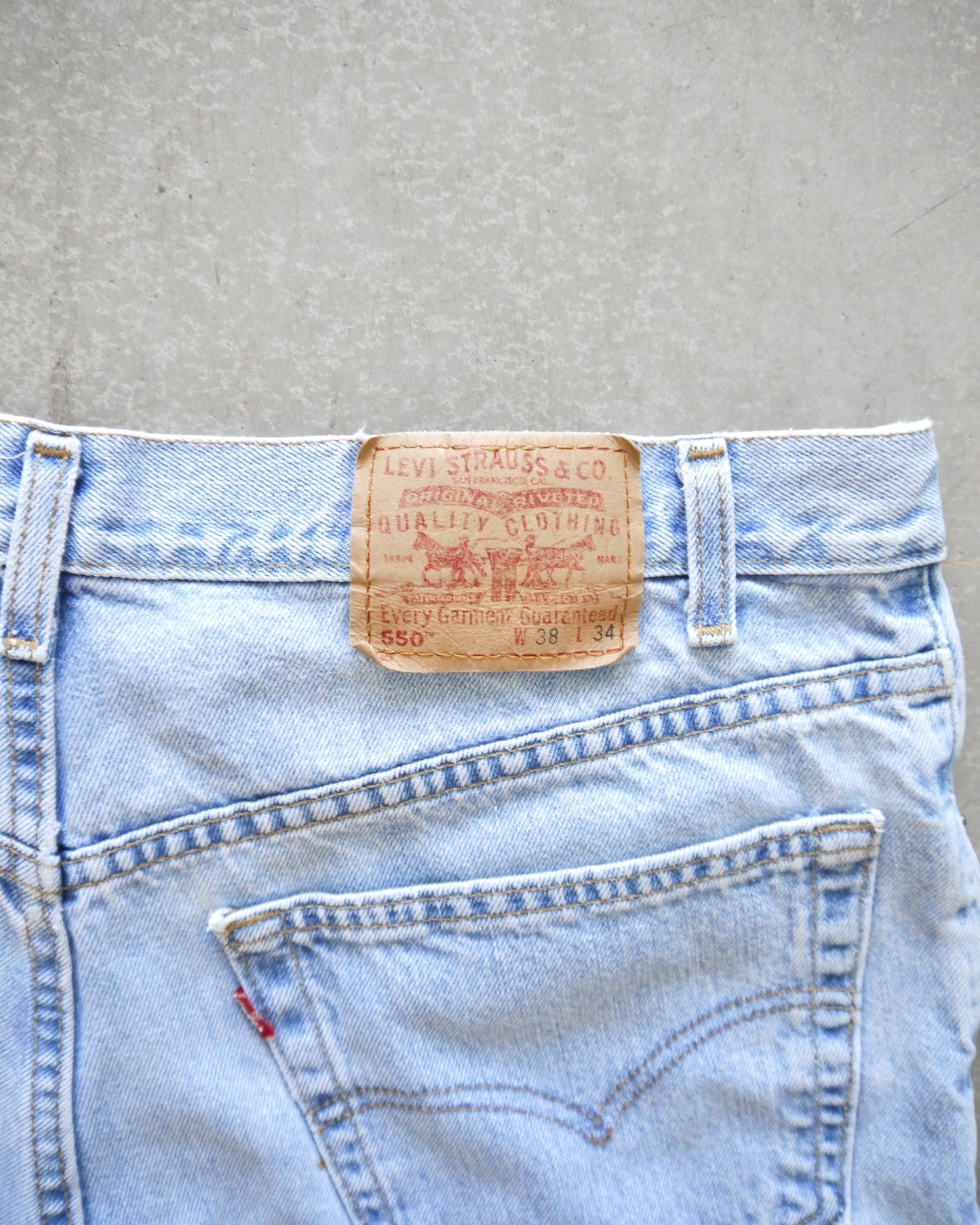 90s Levi’s 550 Baggy Cutoff Denim Shorts (36)