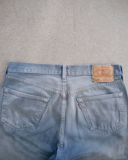 90s Levi’s 501 Sun Faded Dusk Blue Released Hem Jeans (34x31)