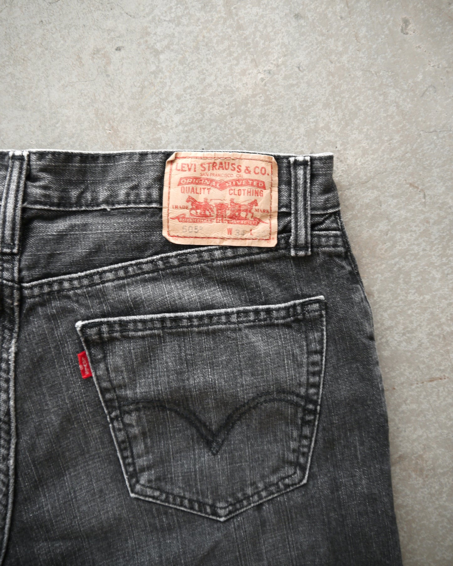 Early 2000s Levi’s 505 Faded Black Clawmark Jeans (34x31)